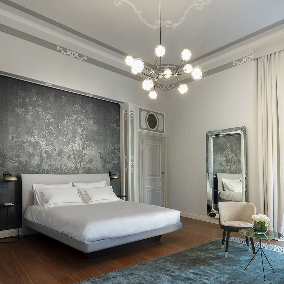 Nabila 552.12 Pendelleuchte 12-flammig Ø: 102 cm, Schwarz Matt / Messing & Klarglas Nabila 552.12 Pendelleuchte 12-flammig Ø: 102 cm, Schwarz Matt / Schwarz Chrom & Rauchglas