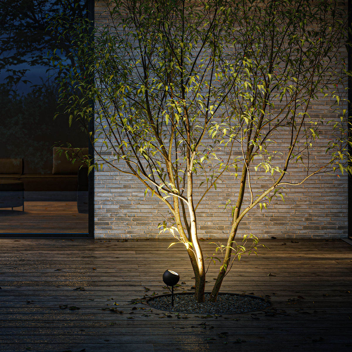 Runde Bodenleuchte für außen mit Schuko Stecker im Garten unter einem Baum