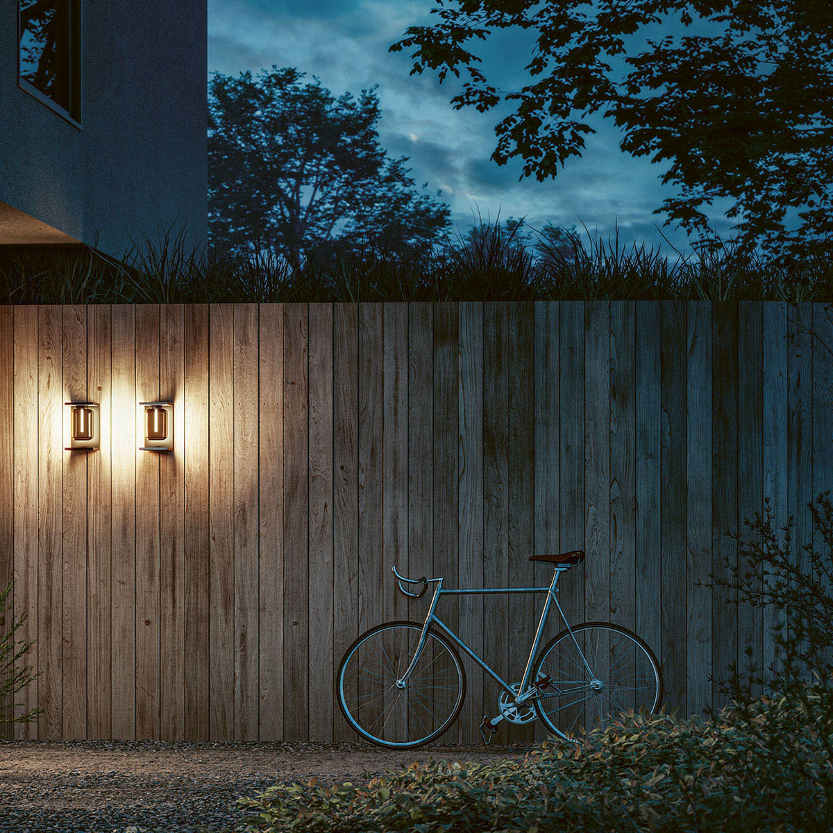 Ovale Wandleuchte für außen am Zaun befestigt