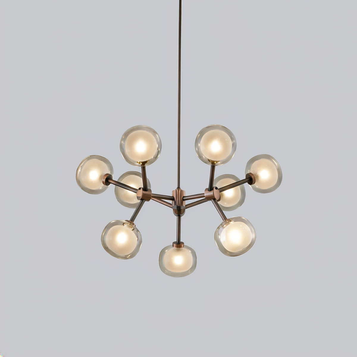 TOOY_Nabila_552_19_C83_C64.jpg TOOY Nabila 552.19 Pendelleuchte 9-flammig Ø: 65 cm Satin Titanium / Dunkelbronze & Champagnerglas